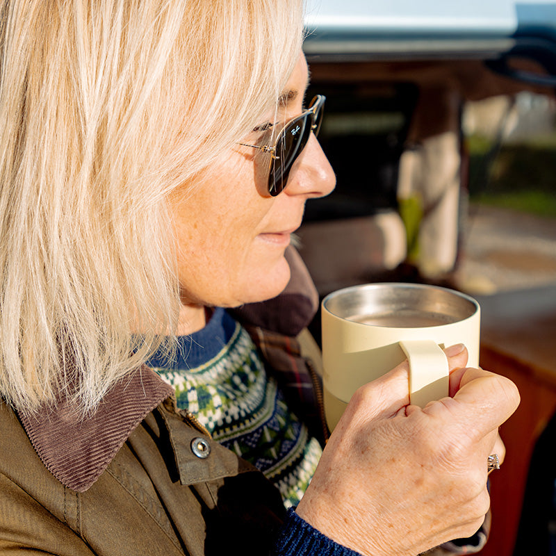 12oz-rise-mug-j5 12oz_rise_coffee_mug_wax_yellow_woman_drink_closeup_square.jpg