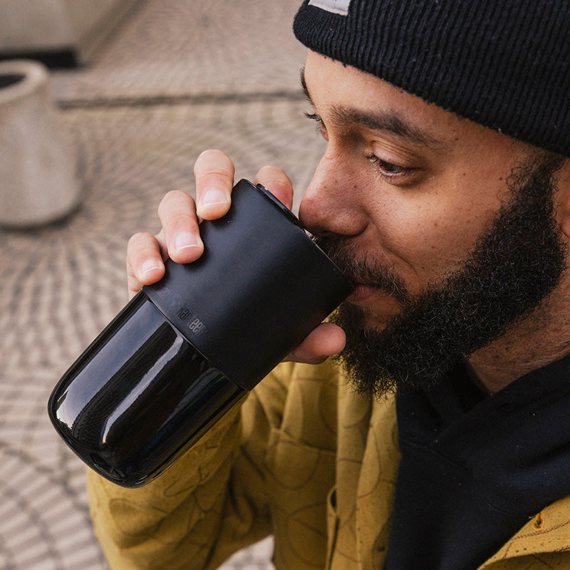 daily-on-the-go-set-x8 16oz_rise_tumbler_black_man_drink_square.jpg