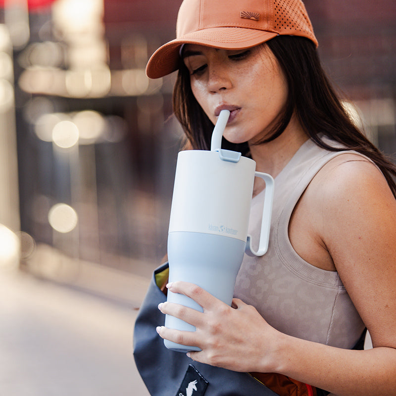 36oz-rise-tumbler-with-straw-lid-c0 36oz_rise_tumbler_straw_girl_sip_square.jpg