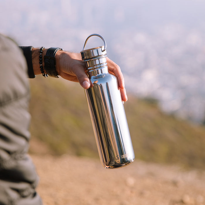 27oz-reflect-with-bamboo-cap-k6 K27SSLRF-MS-BAMBOO_reflect_bottle_hand_lifestyle.jpg